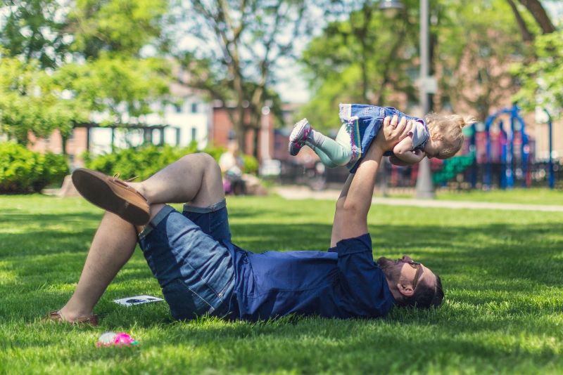 dad having fun with daughter